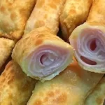 Rolinho de pastel com presunto e queijo